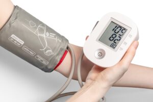 A blood pressure cuff showing healthy blood pressure