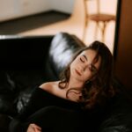 mom resting peacefully — natural energy and sleep support through chiropractic care